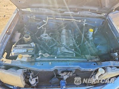 Zdjęcie 11 z 13 samochodu: 2000 NISSAN FRONTIER XE VIN:1N6DD21S9YC313041 - miniatura