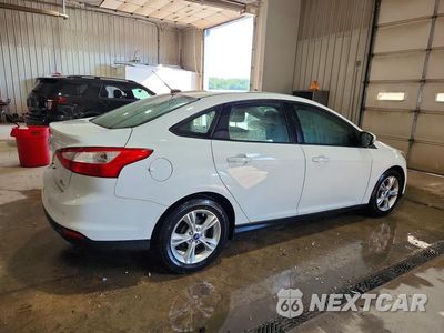 Trzecie zdjęcie samochodu z tyłu: 2014 FORD FOCUS SE VIN:1FADP3F28EL309847 - miniatura