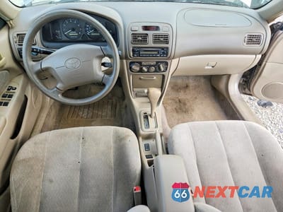Zdjęcie 8 z 13 samochodu: 2001 TOYOTA COROLLA LE VIN:2T1BR12E01C506416 - miniatura