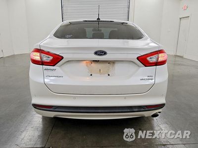 Zdjęcie 6 z 12 samochodu: 2013 FORD FUSION SE HYBRID VIN:3FA6P0LU5DR303372 - miniatura