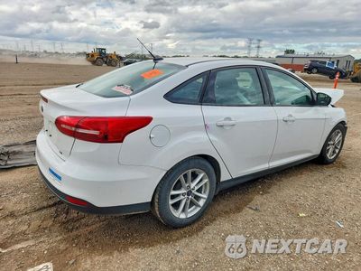 Trzecie zdjęcie samochodu z tyłu: 2017 FORD FOCUS SE VIN:1FADP3F24HL300373 - miniatura
