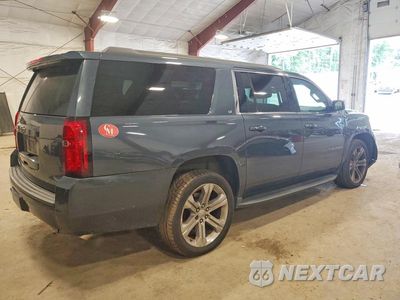 Trzecie zdjęcie samochodu z tyłu: 2019 CHEVROLET SUBURBAN K1500 LT VIN:1GNSKHKC3KR405462 - miniatura