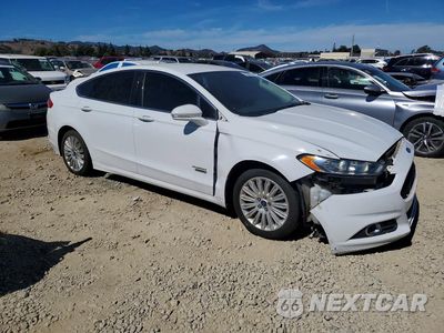Czwarte zdjęcie samochodu z boku: 2014 FORD FUSION SE PHEV VIN:3FA6P0PU4ER293669 - miniatura