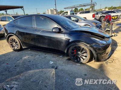 Czwarte zdjęcie samochodu z boku: 2022 TESLA MODEL Y VIN:7SAYGDEFXNF338505 - miniatura
