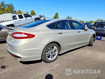 Trzecie zdjęcie samochodu z tyłu: 2015 FORD FUSION TITANIUM HEV VIN:3FA6P0RU6FR184225 - miniatura