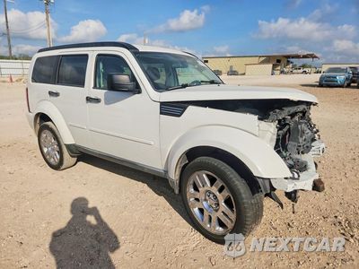 Czwarte zdjęcie samochodu z boku: 2010 DODGE NITRO HEAT VIN:1D4PT4GK6AW163287 - miniatura