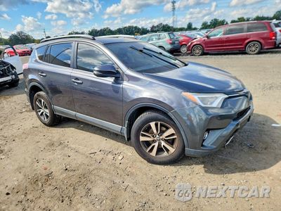 Czwarte zdjęcie samochodu z boku: 2017 TOYOTA RAV4 XLE VIN:JTMRFREV3HJ708554 - miniatura