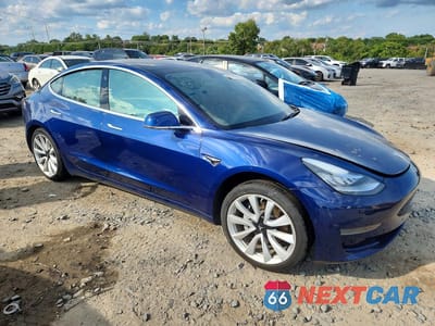 Czwarte zdjęcie samochodu z boku: 2020 TESLA MODEL 3 VIN:5YJ3E1EA0LF615871 - miniatura