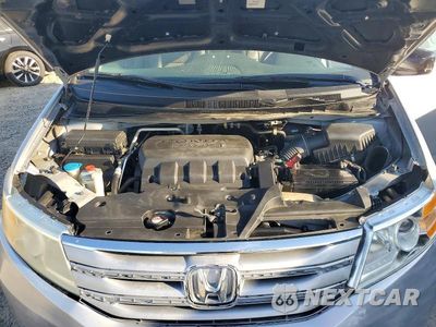 Zdjęcie 12 z 13 samochodu: 2011 HONDA ODYSSEY EXL VIN:5FNRL5H67BB062617 - miniatura
