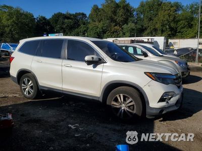 Czwarte zdjęcie samochodu z boku: 2017 HONDA PILOT EX VIN:5FNYF6H33HB052139 - miniatura
