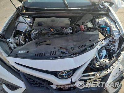 Zdjęcie 11 z 12 samochodu: 2022 TOYOTA CAMRY SE VIN:4T1G11AK5NU713053 - miniatura