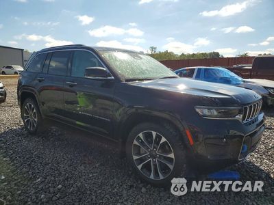 Czwarte zdjęcie samochodu z boku: 2022 JEEP GRAND CHEROKEE OVERLAND 4XE VIN:1C4RJYD66N8764736 - miniatura