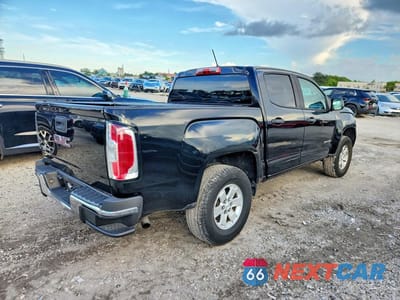 Trzecie zdjęcie samochodu z tyłu: 2018 GMC CANYON VIN:1GTG5BEA1J1199830 - miniatura