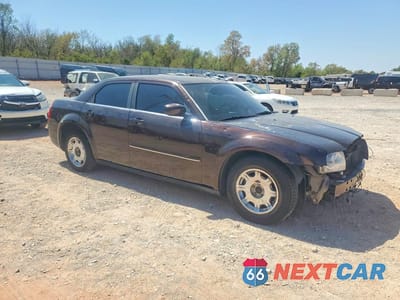Czwarte zdjęcie samochodu z boku: 2005 CHRYSLER 300 TOURING VIN:2C3JA53G45H134024 - miniatura