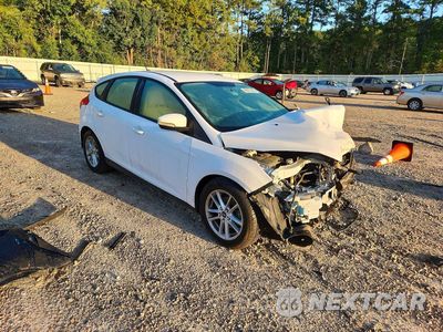 Czwarte zdjęcie samochodu z boku: 2017 FORD FOCUS SE VIN:1FADP3K22HL294434 - miniatura