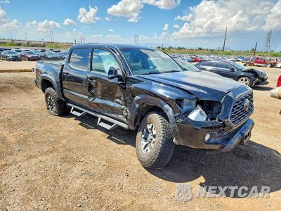 Czwarte zdjęcie samochodu z boku: 2021 TOYOTA TACOMA TRD OFF-ROAD VIN:3TMCZ5AN6MM412047 - miniatura