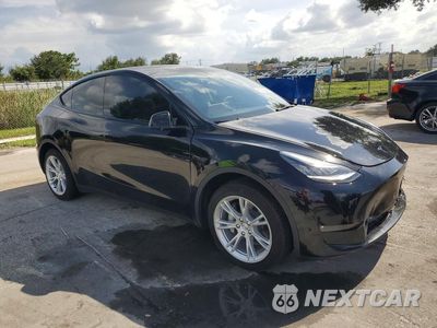 Czwarte zdjęcie samochodu z boku: 2022 TESLA MODEL Y VIN:7SAYGDEE9NF427618 - miniatura