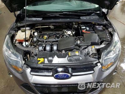 Zdjęcie 11 z 12 samochodu: 2014 FORD FOCUS TITANIUM VIN:1FADP3N24EL399192 - miniatura
