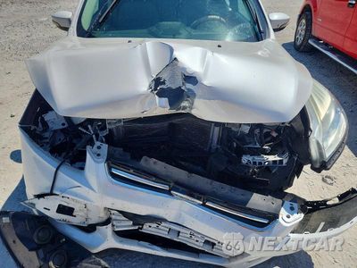 Zdjęcie 12 z 13 samochodu: 2013 FORD ESCAPE SEL VIN:1FMCU0HX6DUB02965 - miniatura