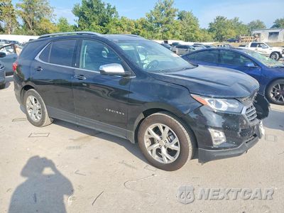 Czwarte zdjęcie samochodu z boku: 2020 CHEVROLET EQUINOX PREMIER VIN:2GNAXNEV6L6271472 - miniatura
