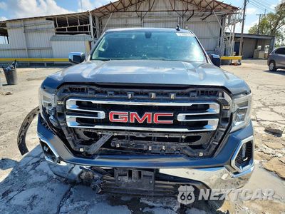 Piąte zdjęcie samochodu w środku: 2019 GMC SIERRA K1500 SLT VIN:3GTU9DED8KG267024 - miniatura