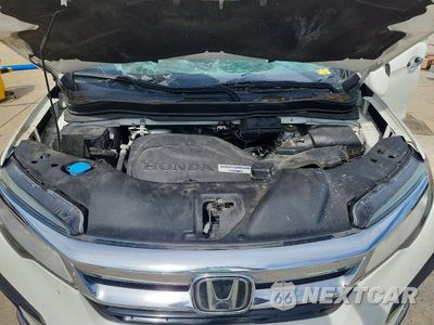 Zdjęcie 12 z 13 samochodu: 2019 HONDA PILOT TOURING VIN:5FNYF5H66KB029160 - miniatura