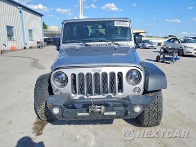 Piąte zdjęcie samochodu w środku: 2017 JEEP WRANGLER UNLIMITED SPORT VIN:1C4HJWDG4HL654357 - miniatura