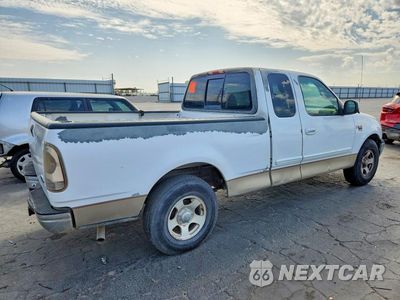 Trzecie zdjęcie samochodu z tyłu: 1999 FORD F150 VIN:1FTRX17L2XKA10777 - miniatura
