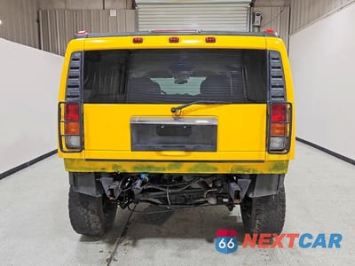 Zdjęcie 6 z 13 samochodu: 2003 HUMMER H2 VIN:5GRGN23U13H146938 - miniatura