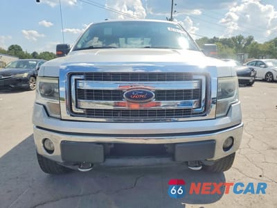 Piąte zdjęcie samochodu w środku: 2014 FORD F150 SUPERCREW VIN:1FTFW1EF3EFB67064 - miniatura