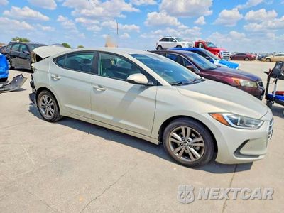 Czwarte zdjęcie samochodu z boku: 2017 HYUNDAI ELANTRA SE VIN:KMHD84LF6HU430133 - miniatura