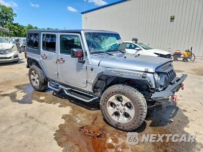 Czwarte zdjęcie samochodu z boku: 2018 JEEP WRANGLER UNLIMITED SAHARA VIN:1C4BJWEG0JL842545 - miniatura