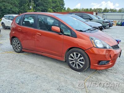 Czwarte zdjęcie samochodu z boku: 2012 HONDA FIT SPORT VIN:JHMGE8H5XCC042112 - miniatura
