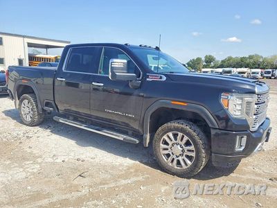 Czwarte zdjęcie samochodu z boku: 2022 GMC SIERRA K3500 DENALI VIN:1GT49WEY6NF290063 - miniatura