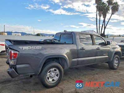 Trzecie zdjęcie samochodu z tyłu: 2020 TOYOTA TACOMA TRD OFF-ROAD VIN:3TMDZ5BN5LM092124 - miniatura