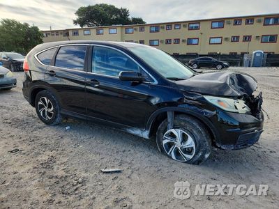 Czwarte zdjęcie samochodu z boku: 2016 HONDA CR-V LX VIN:2HKRM3H38GH557201 - miniatura