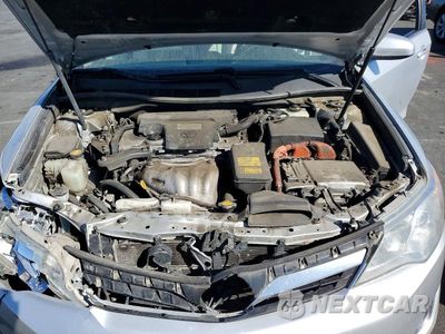 Zdjęcie 11 z 12 samochodu: 2013 TOYOTA CAMRY HYBRID XLE VIN:4T1BD1FK7DU090169 - miniatura