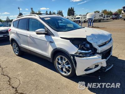 Czwarte zdjęcie samochodu z boku: 2014 FORD ESCAPE TITANIUM VIN:1FMCU0J97EUB64601 - miniatura