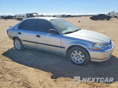 Czwarte zdjęcie samochodu z boku: 1998 HONDA CIVIC LX VIN:2HGEJ6674WH613996 - miniatura