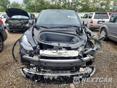 Piąte zdjęcie samochodu w środku: 2025 TESLA MODEL Y VIN:7SAYGDEE0SF223494 - miniatura