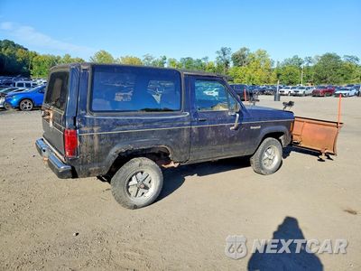 Trzecie zdjęcie samochodu z tyłu: 1988 FORD BRONCO II VIN:1FMCU14T3JUC83043 - miniatura