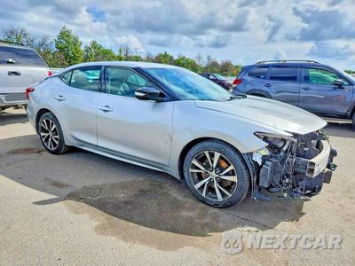 Czwarte zdjęcie samochodu z boku: 2016 NISSAN MAXIMA 3.5 SV VIN:1N4AA6AP7GC437427 - miniatura