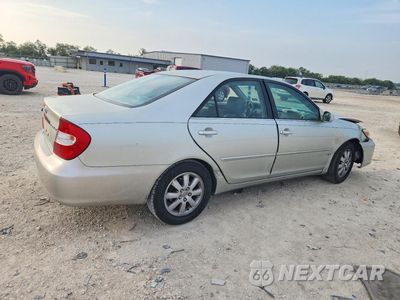 Trzecie zdjęcie samochodu z tyłu: 2002 TOYOTA CAMRY XLE VIN:JTDBE30K820076050 - miniatura
