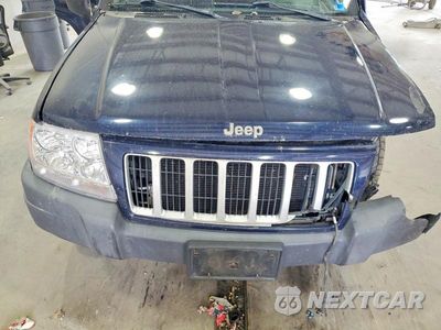 Zdjęcie 12 z 13 samochodu: 2004 JEEP GRAND CHEROKEE LAREDO VIN:1J4GW48S34C344947 - miniatura