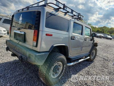 Trzecie zdjęcie samochodu z tyłu: 2004 HUMMER H2 VIN:5GRGN23U24H122276 - miniatura