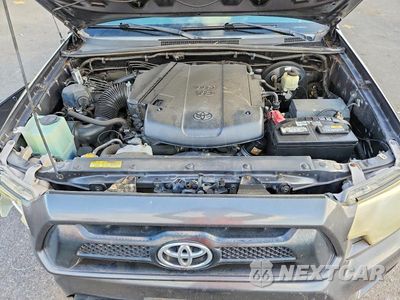 Zdjęcie 11 z 12 samochodu: 2015 TOYOTA TACOMA V6 VIN:3TMLU4EN2FM200624 - miniatura