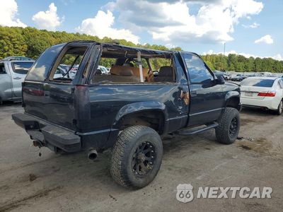 Trzecie zdjęcie samochodu z tyłu: 1997 GMC YUKON VIN:3GKEK18R7VG526657 - miniatura