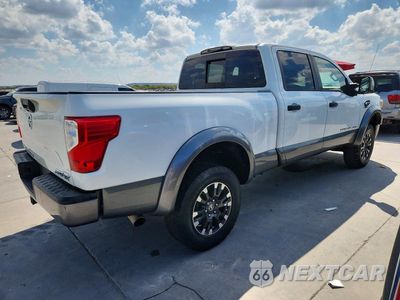 Trzecie zdjęcie samochodu z tyłu: 2018 NISSAN TITAN XD PRO-4X VIN:1N6BA1F49JN514615 - miniatura
