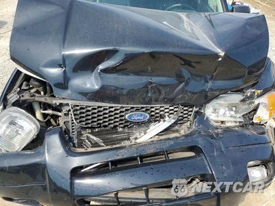 Zdjęcie 12 z 13 samochodu: 2003 FORD ESCAPE LIMITED VIN:1FMCU941X3KB79631 - miniatura