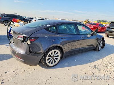 Trzecie zdjęcie samochodu z tyłu: 2023 TESLA MODEL 3 VIN:5YJ3E1EA2PF454686 - miniatura